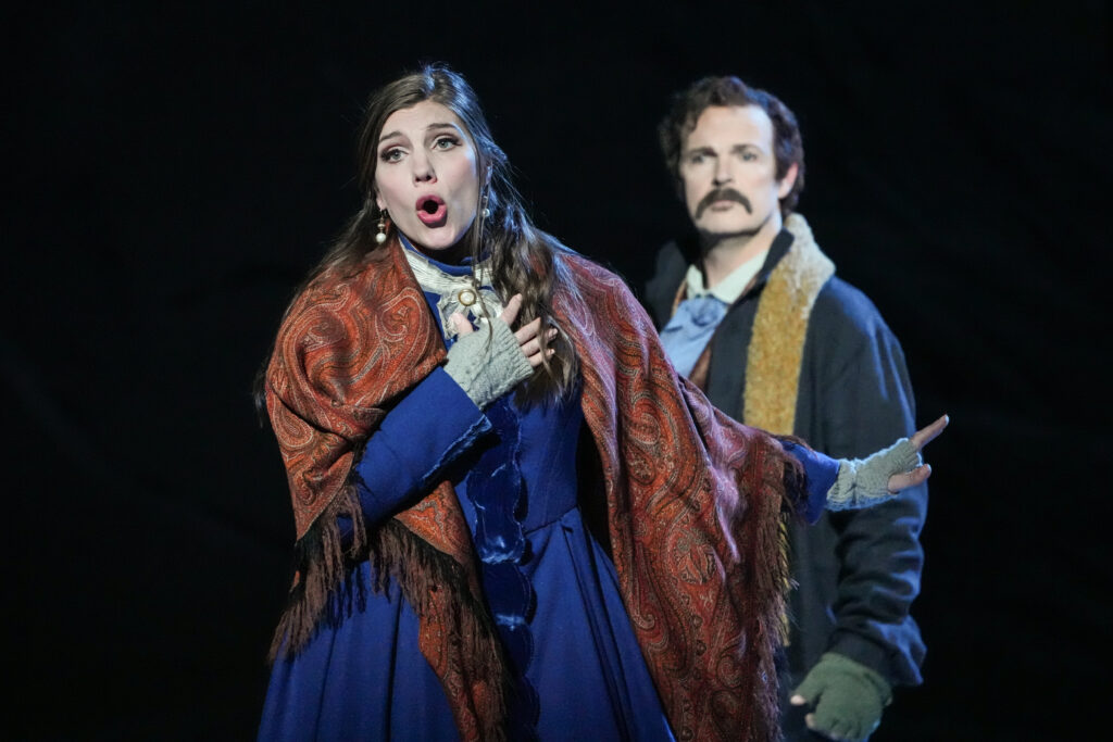 Mimì (Kara Goodrich) and Marcello (Troy Cook) in Act 3 of Puccini’s La bohème. Photo by Steven Pisano.