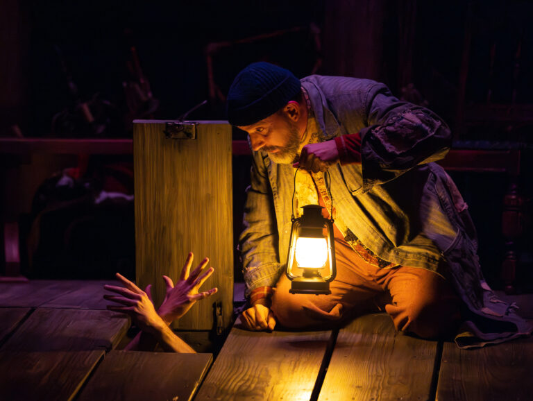 Charlie DelMarcelle as Feste in Lantern Theater Company's production of William Shakespeare's Twelfth Night, directed by Charles McMahon, on stage now through June 18, 2023.